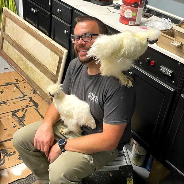Tim doubles as a chicken roost
